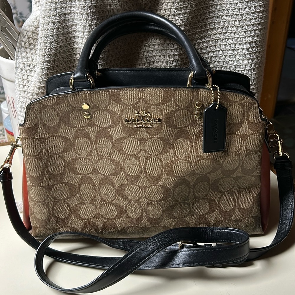Coach Darcie Carryall In Colorblock Signature Canvas (sides are Coach orange).
